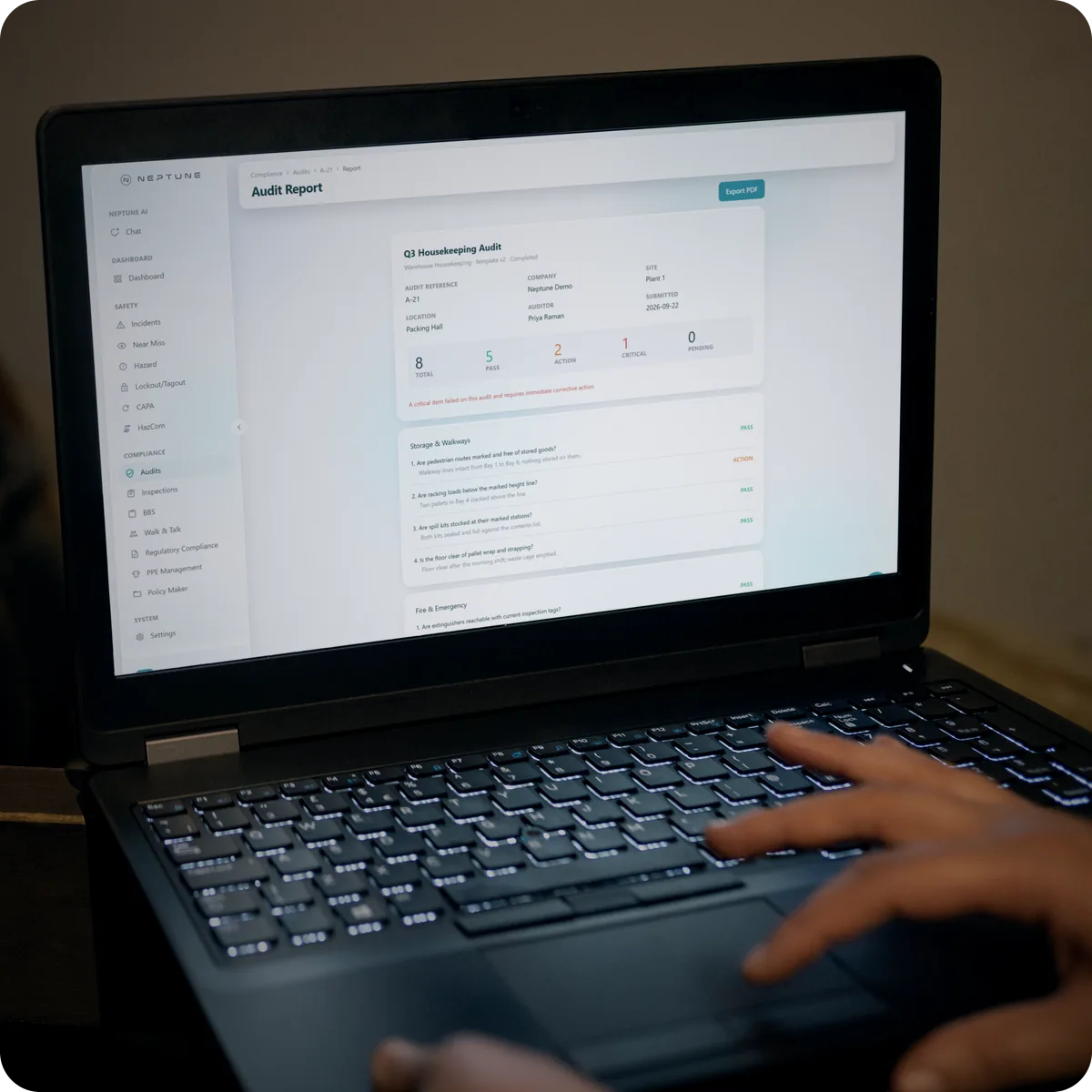 Neptune audit report with every graded question open on a laptop